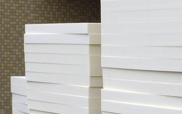 Ravenswood Village Settlement tapered roof insulation costs